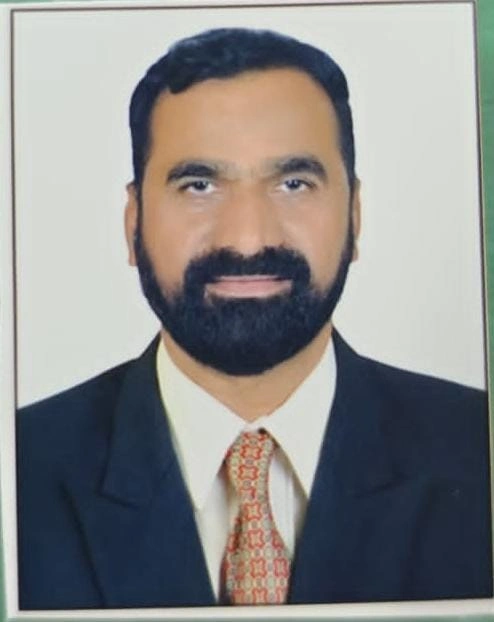 Member Shri Guruning Pradhane